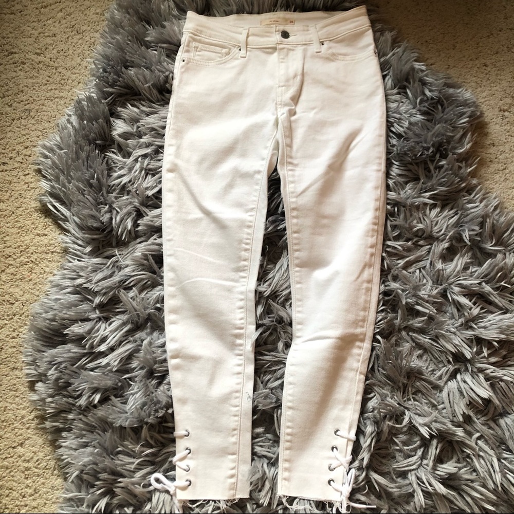 Levi’s 711 Skinny White Jeans With Laced Bottoms